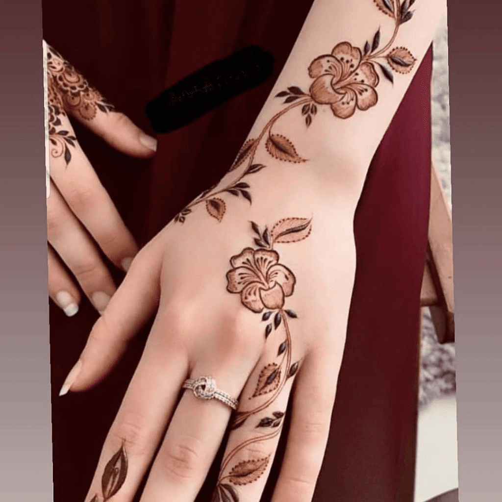 Floral creeper back hand Mehndi design
