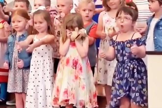 Little Girl Dancing at School Concert