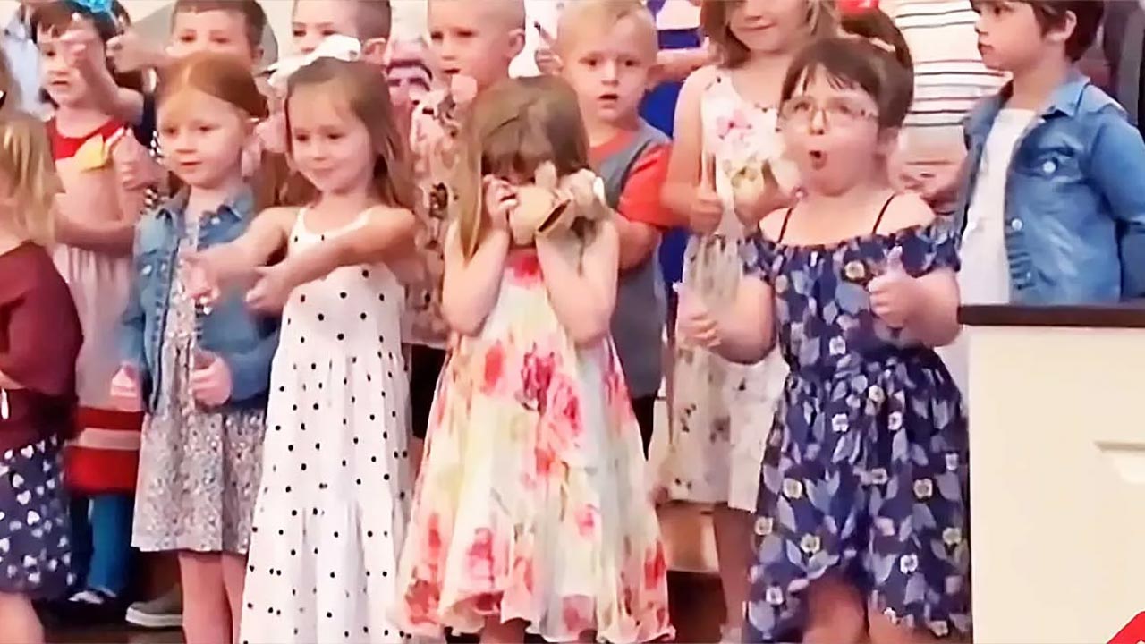Little Girl Dancing at School Concert
